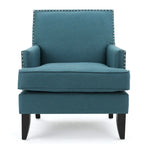 Fauteuil club en tissu clouté
