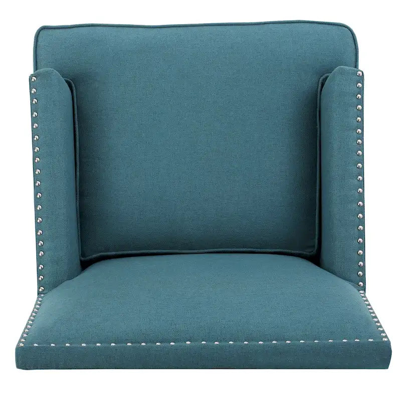 Fauteuil club en tissu clouté