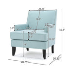 Fauteuil club en tissu clouté