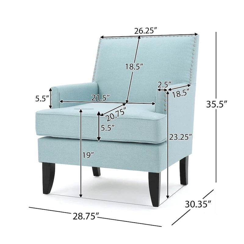 Fauteuil club en tissu clouté
