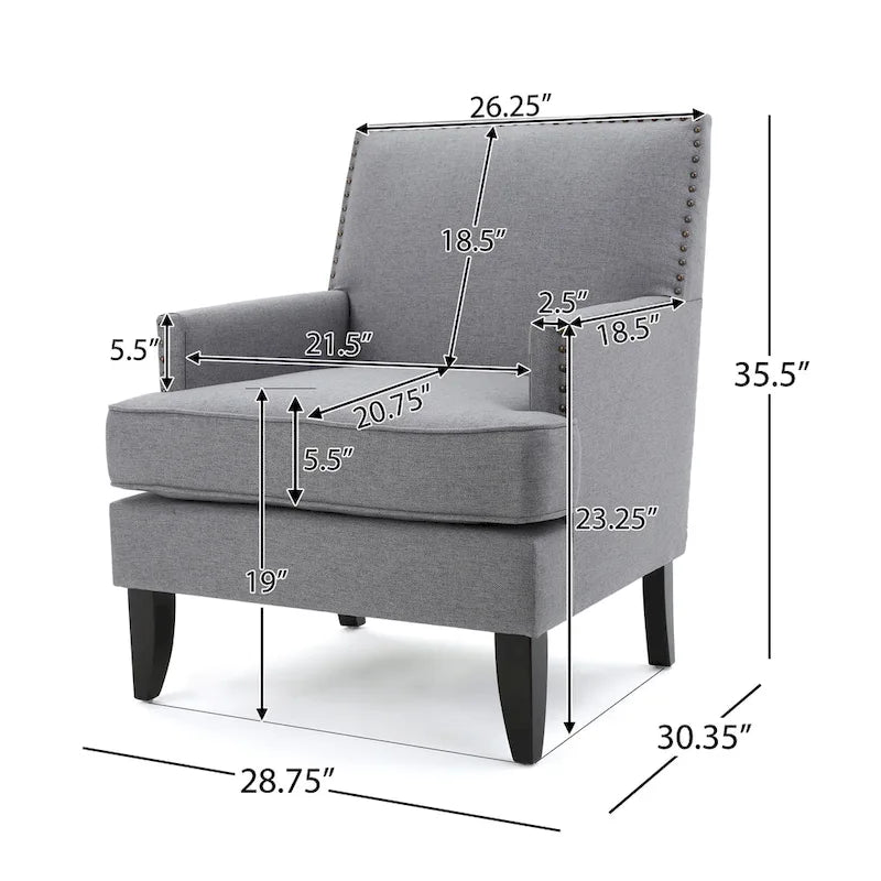 Fauteuil club en tissu clouté
