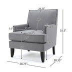 Fauteuil club en tissu clouté