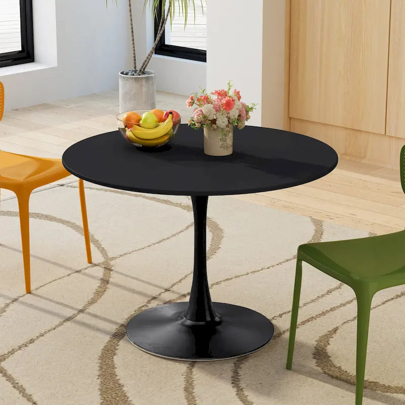 Table à manger moderne avec plateau rond et pied en métal