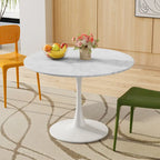Table à manger moderne avec plateau rond et pied en métal