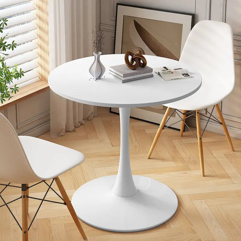 Table à manger moderne avec plateau rond et pied en métal