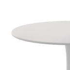 Table à manger moderne avec plateau rond et pied en métal