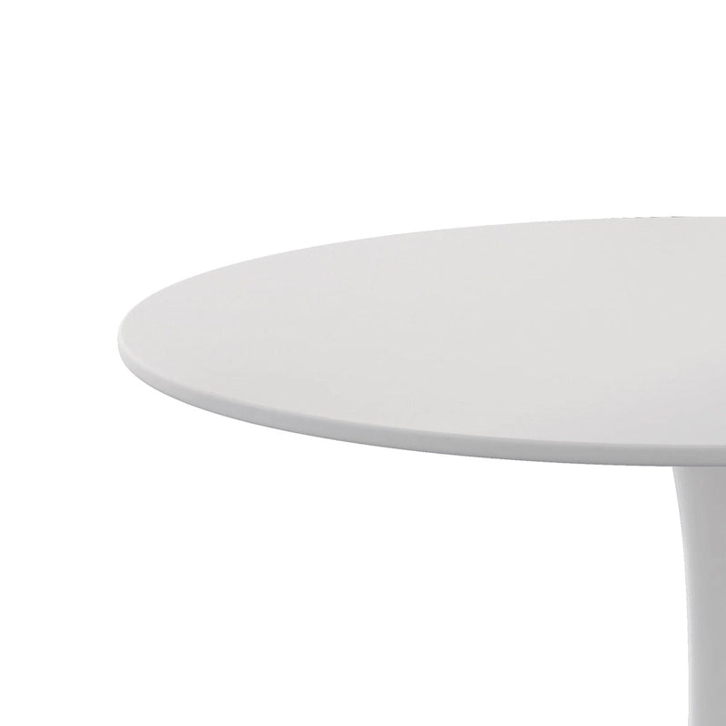 Table à manger moderne avec plateau rond et pied en métal