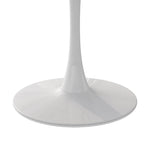 Table à manger moderne avec plateau rond et pied en métal