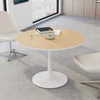 Table à manger moderne avec plateau rond et pied en métal