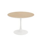 Table à manger moderne avec plateau rond et pied en métal