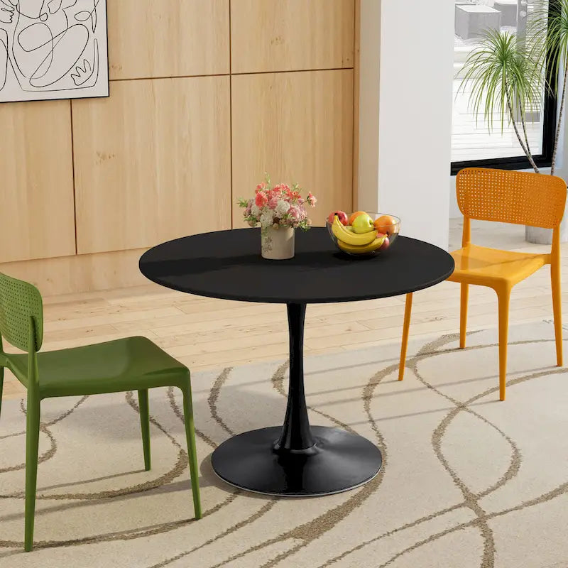 Table à manger moderne avec plateau rond et pied en métal