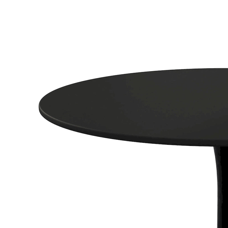Table à manger moderne avec plateau rond et pied en métal