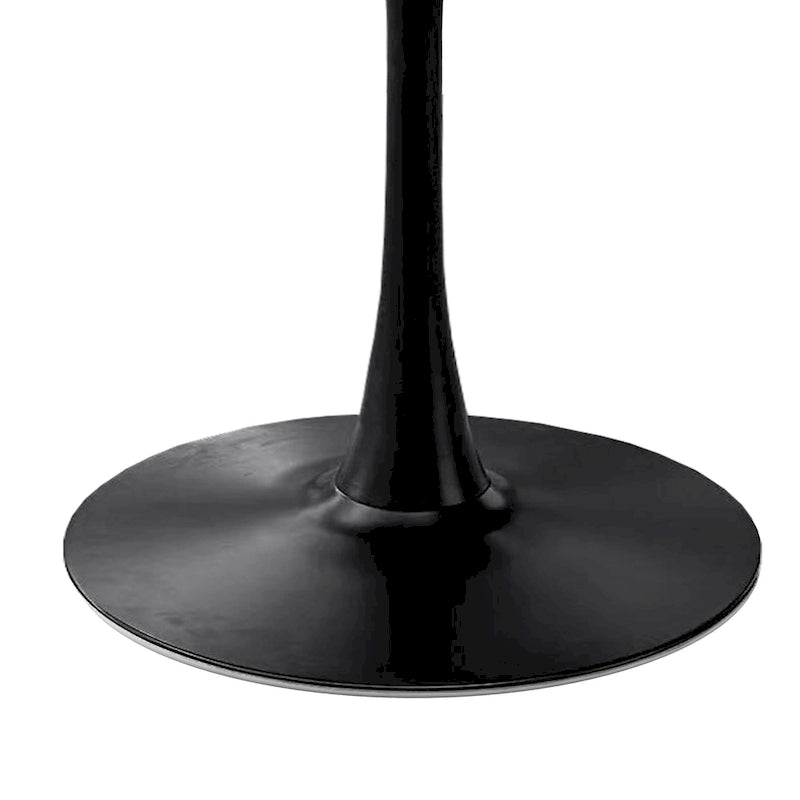 Table à manger moderne avec plateau rond et pied en métal