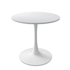 Table à manger moderne avec plateau rond et pied en métal